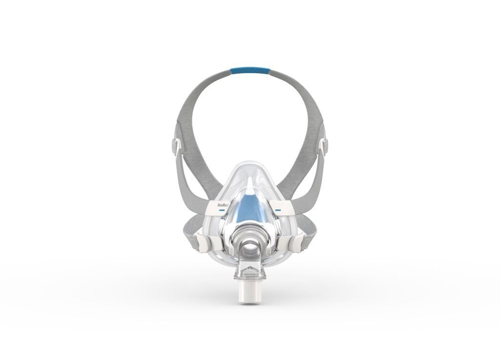 Mascarilla AirFit F20 con detalles de la marca ResMed sobre fondo blanco y vista frontal
